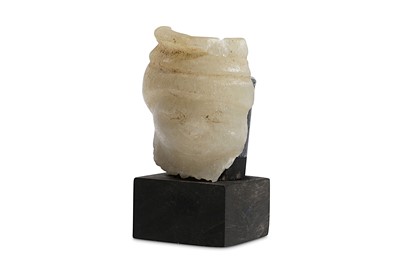 Lot 4 - AN EGYPTIAN CALCITE FACE Middle Kingdom, 12th...