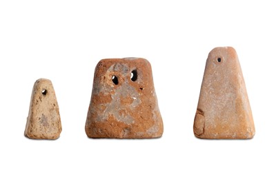 Lot 21 - THREE LARGE ROMANO-EGYPTIAN TERRACOTTA WEIGHTS...