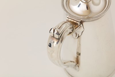 Lot 9 - An interesting George III sterling silver hot...